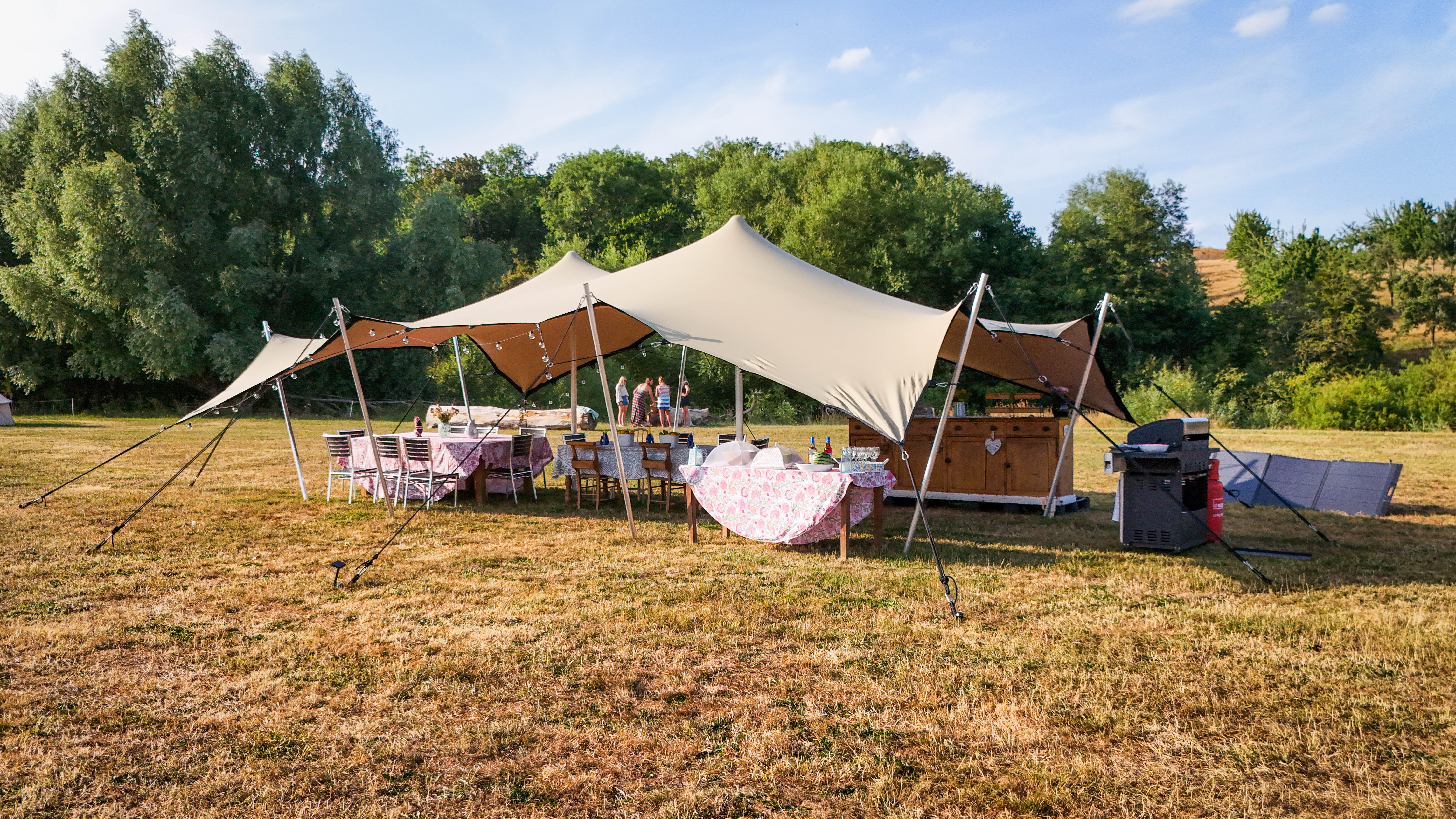 The stretch tent communal area at Hopnest glamping retreat, Worcestershire